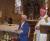 Monseigneur vient de remettre à Marie le diplôme et la croix rouge